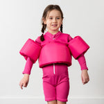 bright pink sunsuit floaties