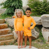 SS2026 "Brights" Neon Orange Ruffle Rashguard Suit