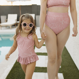 mom and girl matching pink swimwear